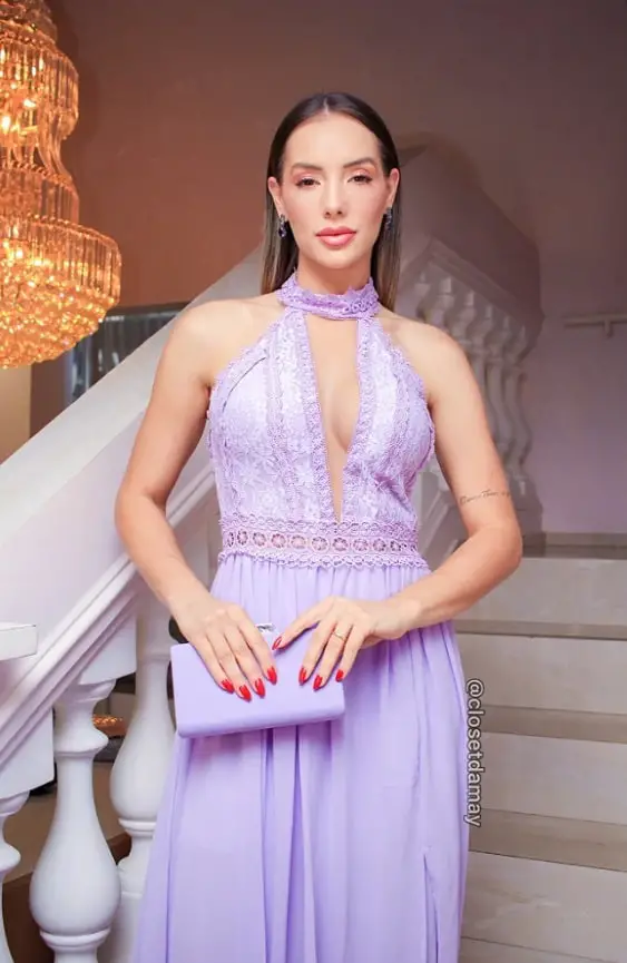 Woman in lavender dress with red nails
