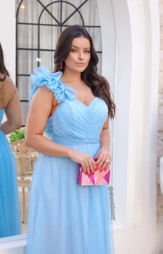 Light blue dress with a colorful purse