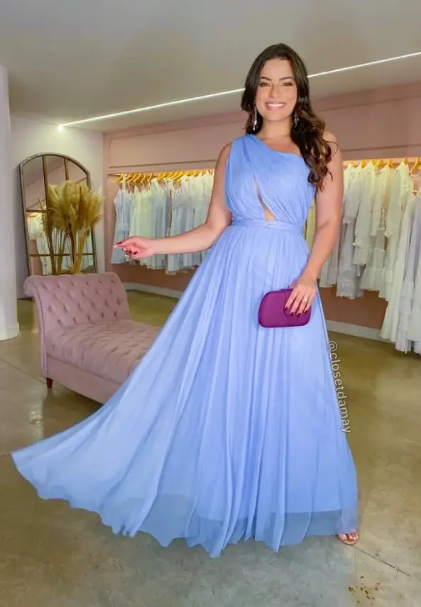 Light blue dress with a purple purse