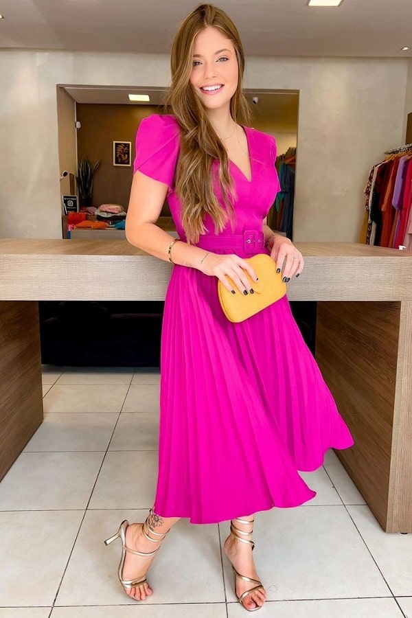 Hot pink dress with black nail polish