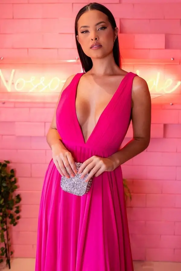 Hot pink dress with coral nail polish