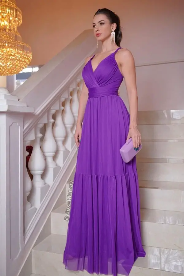 Purple dress with blue nail polish