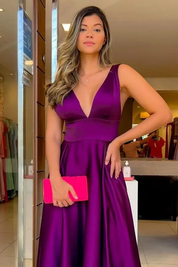 Purple dress with nude nail polish