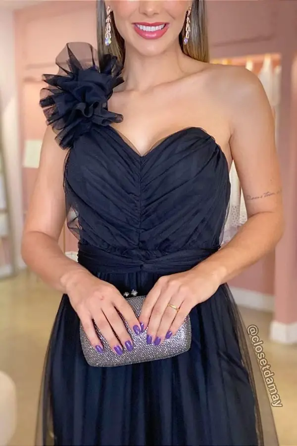 Black dress with purple nail polish