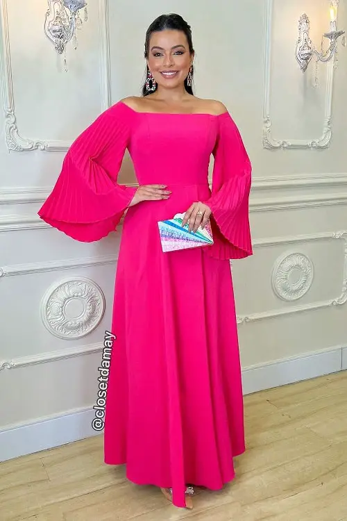 Hot pink dress with colorful clutch bag