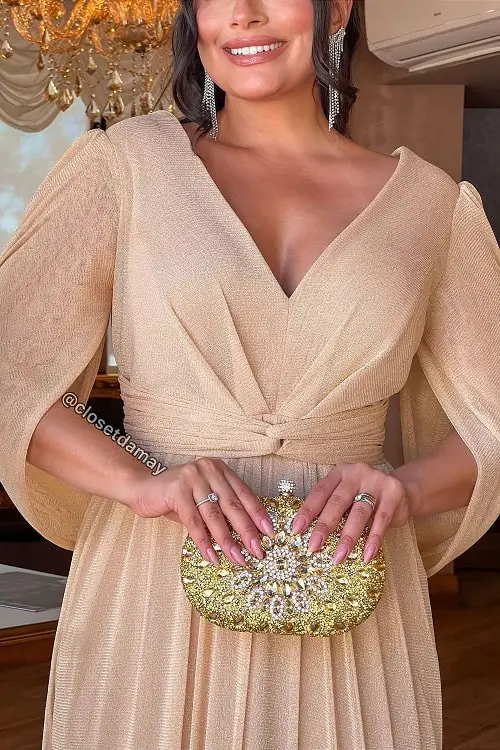 Gold dress with light pink nails