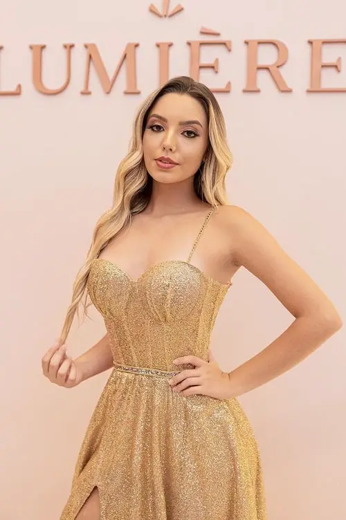 Gold dress with nude nails