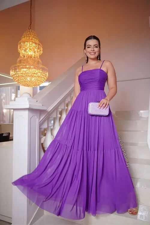 Purple dress with lilac clutch bag