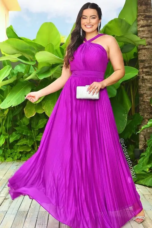 Purple dress with silver clutch bag