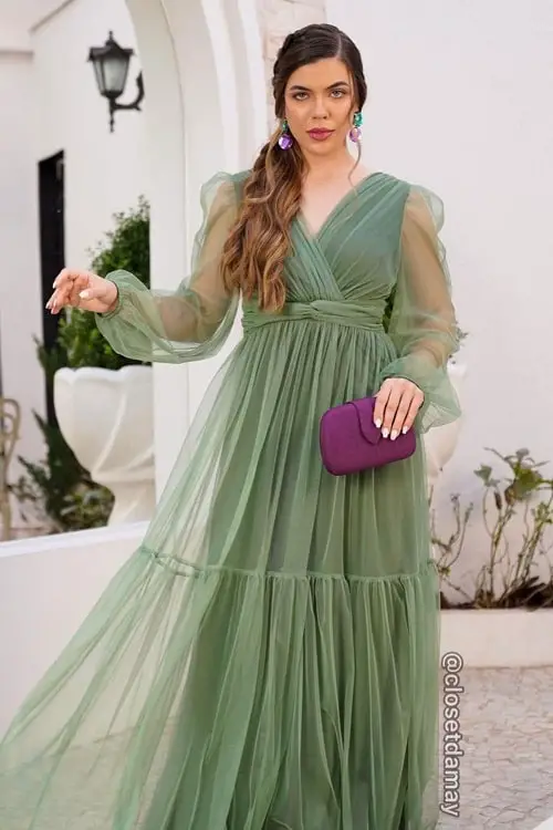 Green dress with green and purple jewelry