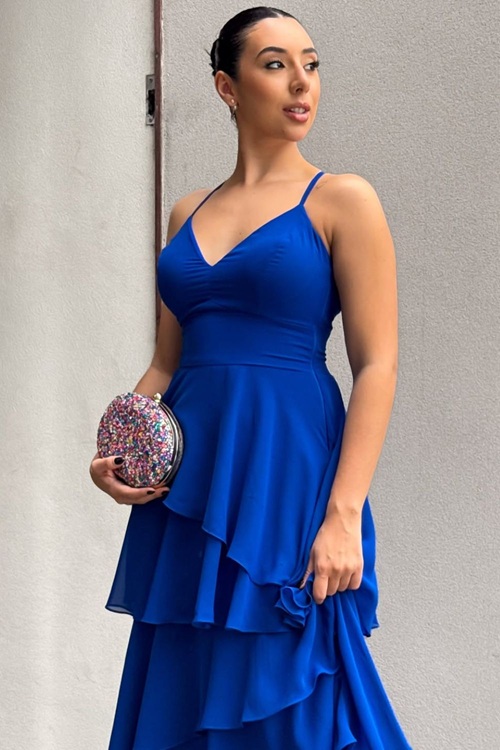 Royal blue dress with colorful clutch